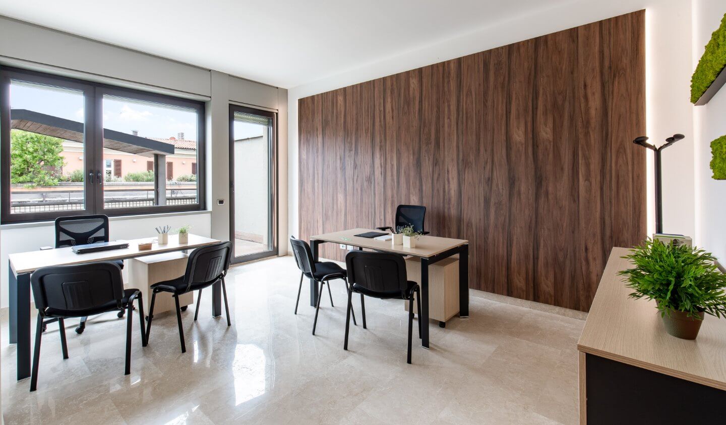 photo of office with glass windows and wooden wall